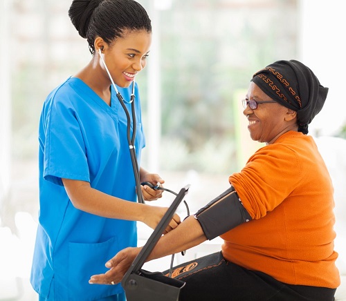 Nurse taking blood pressure photo